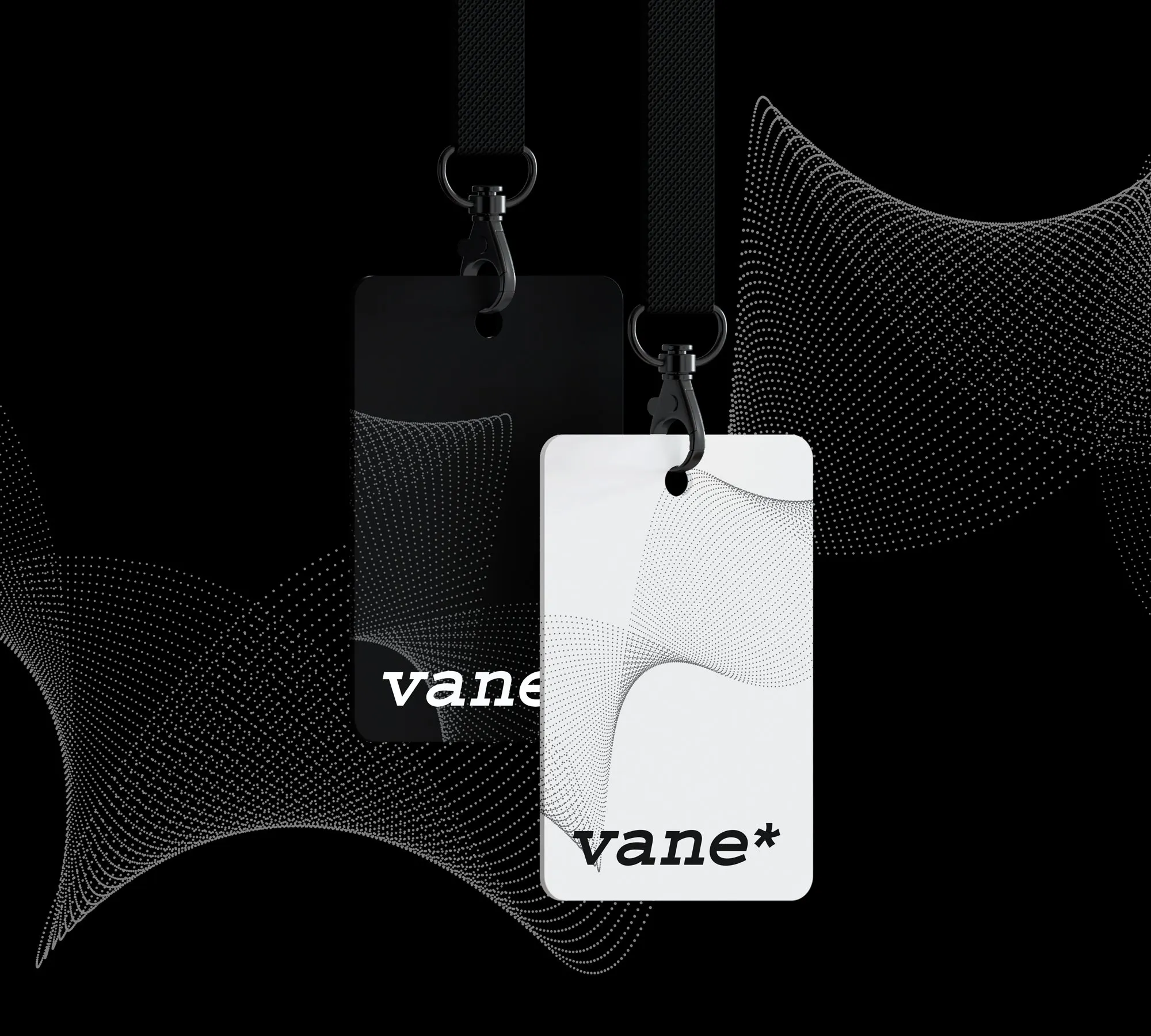שני תגי עובד תלויים של Vane עם לוגו vane* בשחור ובלבן